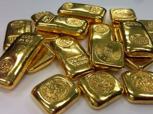 Цената на златото се повишава заради търговското напрежение между САЩ и Китай