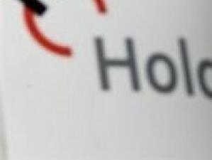 Нетната печалба на Holcim се понижи с 53%