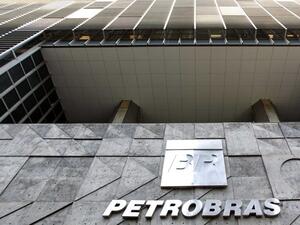 Бразилската държавна петролна компания Petrobras се съгласи да изплати 2 95