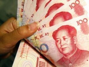 Китайският юан достигна ново рекордно ниво спрямо долара